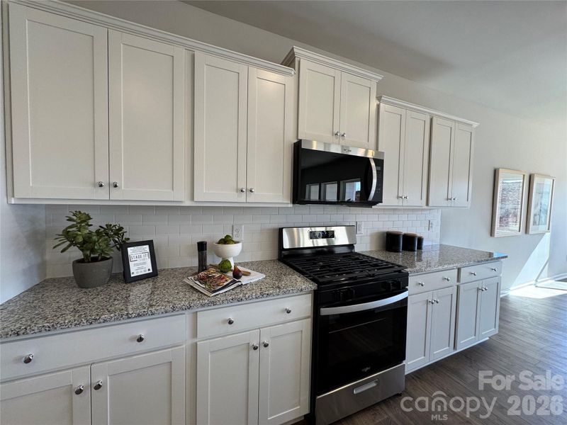Furnished interior view inside a new home in McFarland Estates, York (Image 19).
