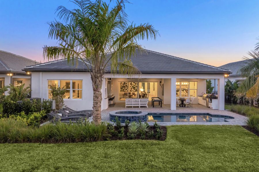 Representative exterior photo of a completed home built from the Emerald by GL Homes in Valencia Ridge, Wesley Chapel, FL (Image 1).