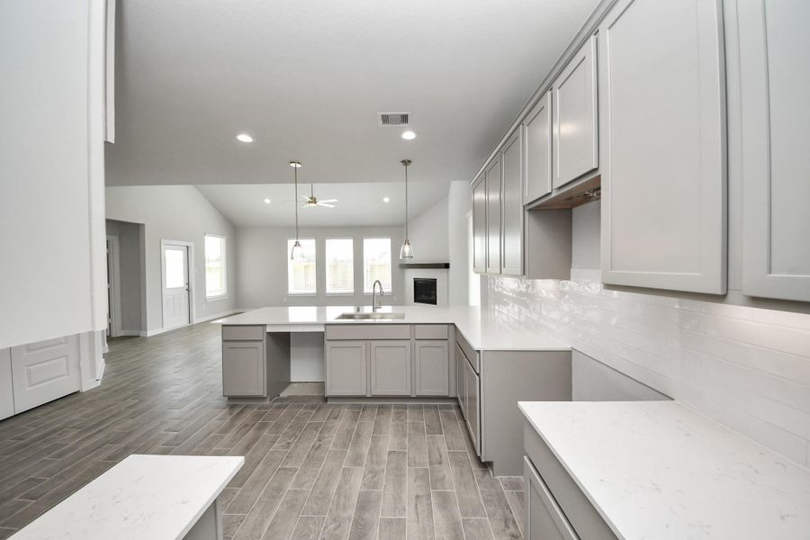 Welcome to a dream kitchen that exceeds expectations! Sample photo of completed home with similar floor plan. Actual colors and selections may vary. Welcome to a dream kitchen that exceeds expectations! Sample photo of completed home with similar floor plan. Actual colors and selections may vary.