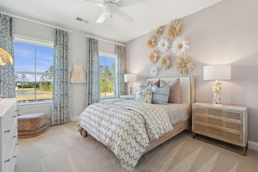 Furnished interior view inside a new home in Tidewater at Lakes of Cane Bay, Summerville (Image 23).