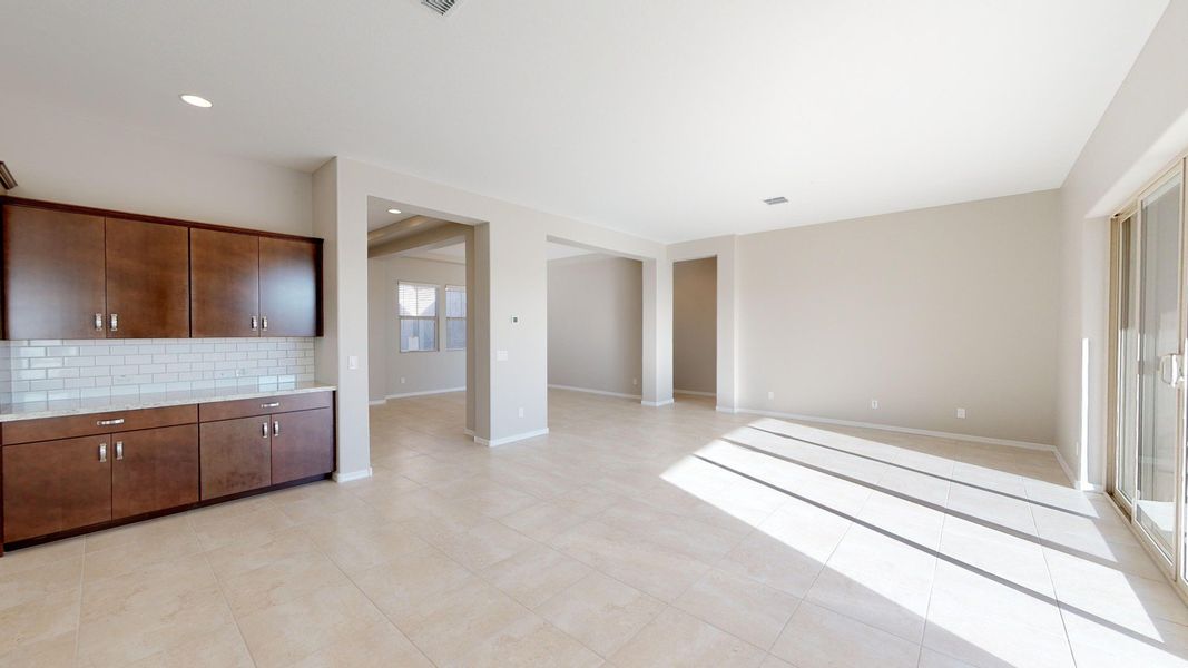 Representative furnished interior of a home built from the Benissa by DRB Homes in Windrose, Waddell (Image 9).
