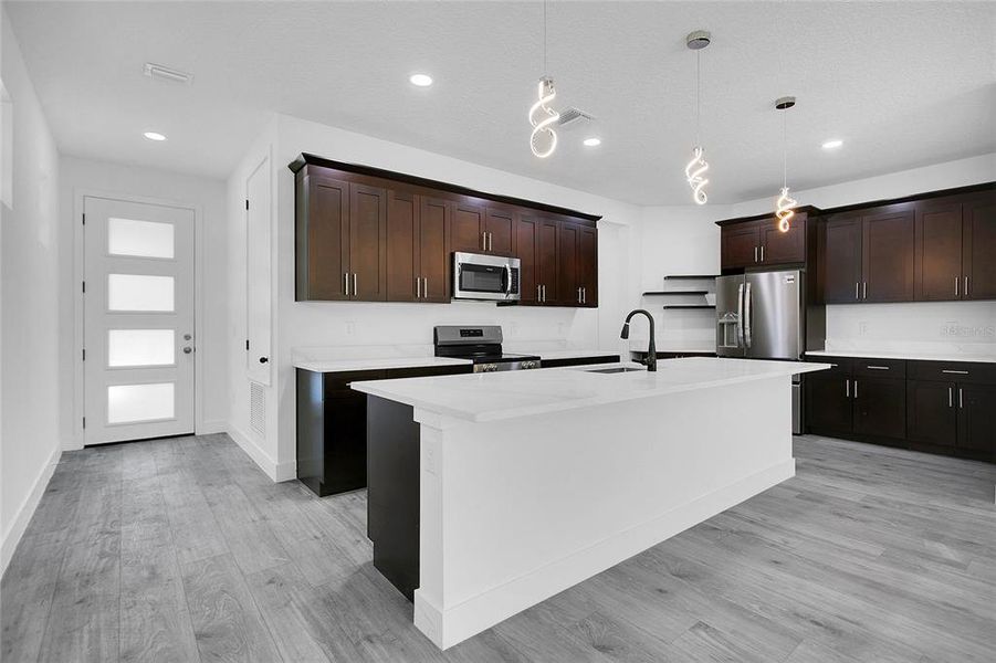 Furnished interior view inside a new home in , Apopka (Image 5).