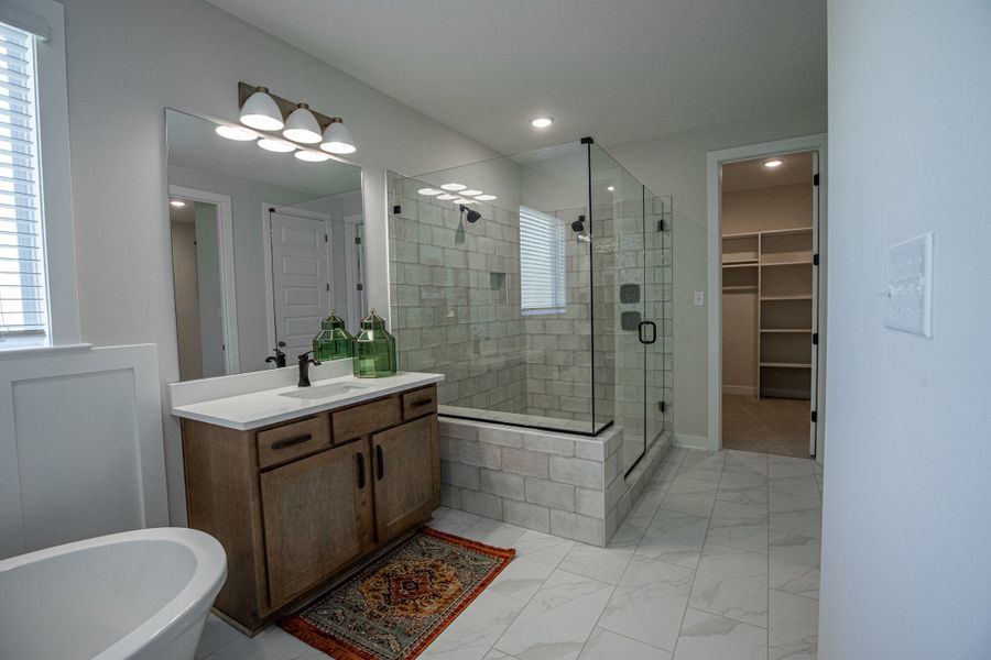 Representative furnished interior of a home built from the Willow by Grant & Co in Manor at Hall Creek, Arlington (Image 126).