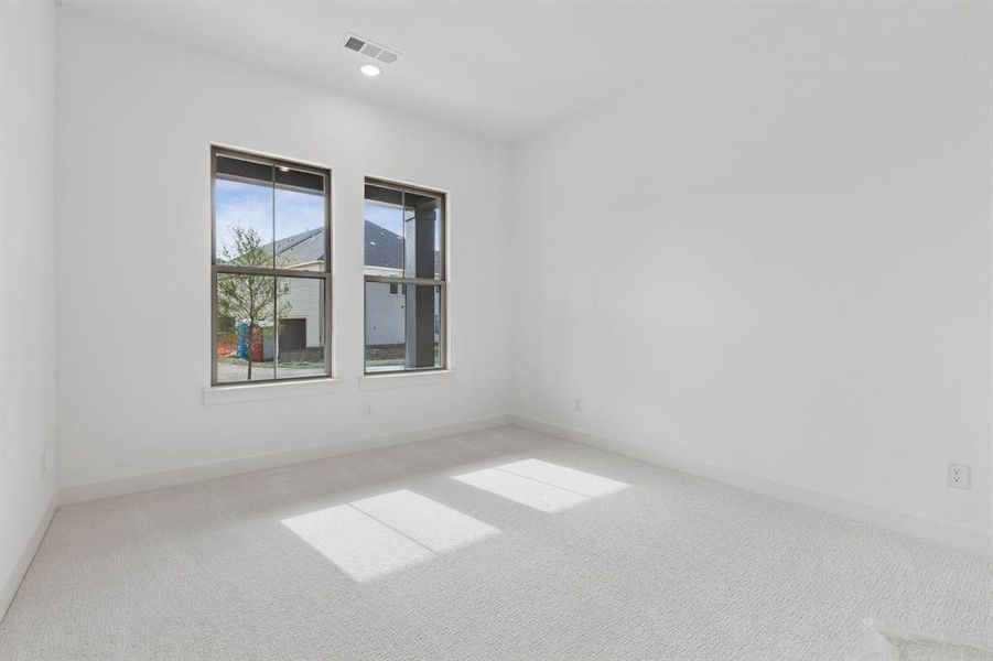 You'll enjoy nicely sized secondary bedrooms in our Rousseau plan.