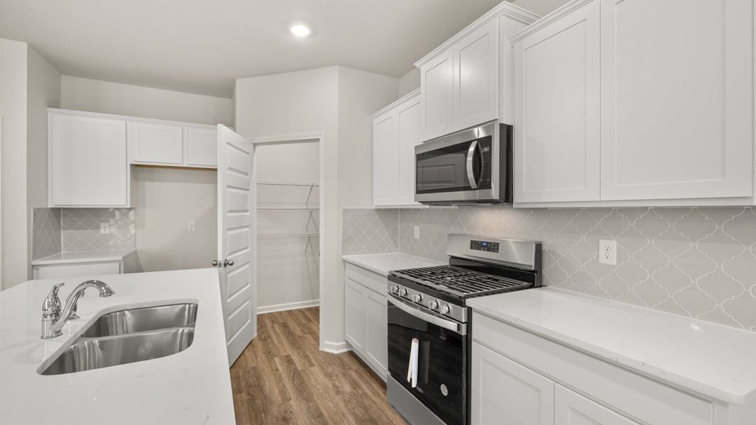 Representative furnished interior of a home built from the Darwin by D.R. Horton in Poplar Preserve, Newnan (Image 9).