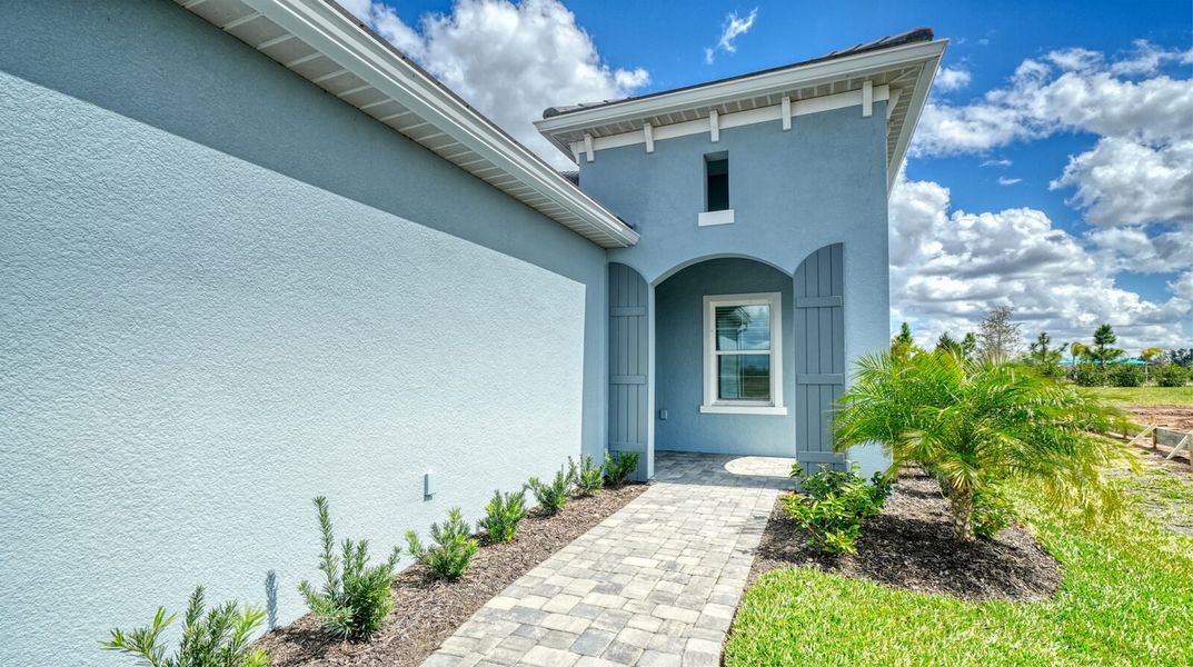 Exterior details and patio area of a home in Palm Grove, Lakewood Ranch (Image 4). Exterior details and patio area of a home in Palm Grove, Lakewood Ranch (Image 4).
