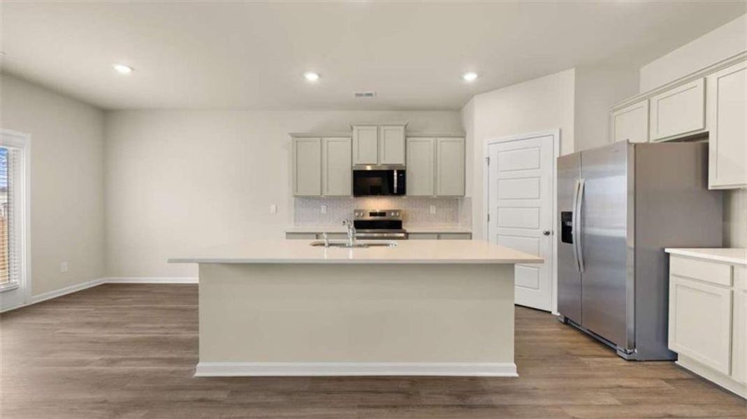 Furnished interior view inside a new home in The Preserve at Agricultural Village, Perry (Image 6).