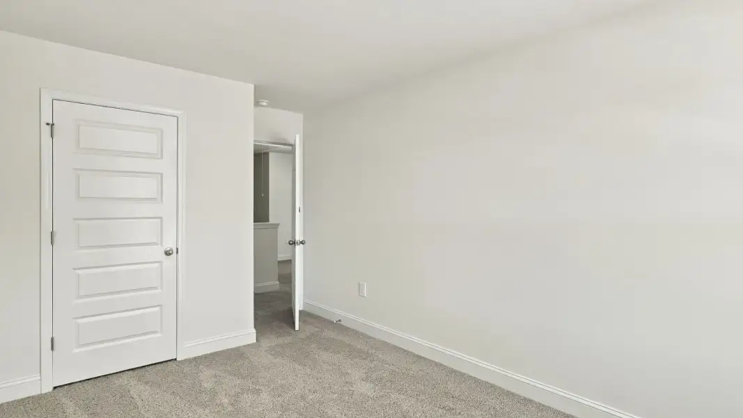 Spacious, unfurnished interior of a new home in The Lakes at North Glynn, Brunswick (Image 21).