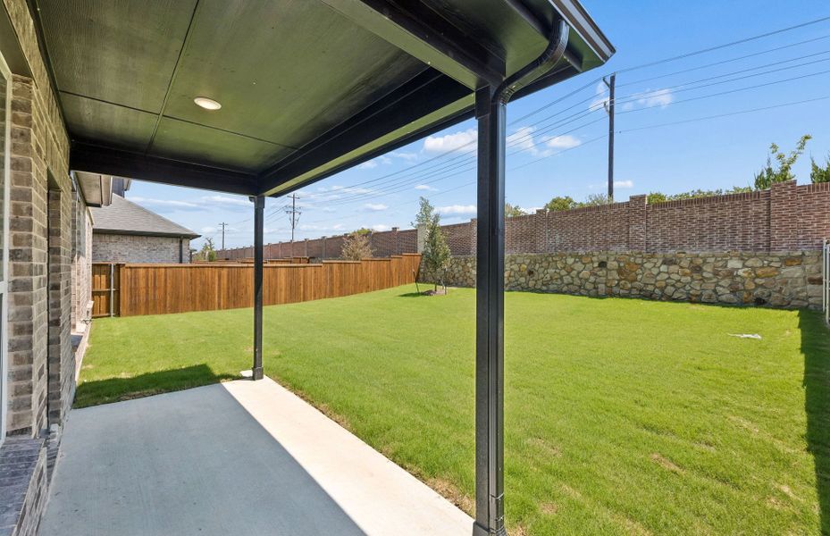 Exterior details and patio area of a home in Pinnacle at Legacy Hills, Celina (Image 3).