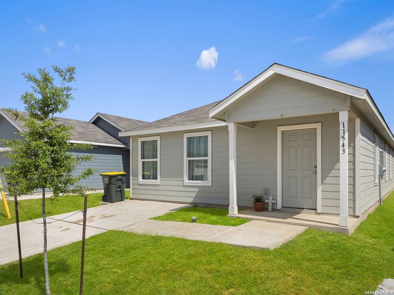 Exterior details and patio area of a home in Rose Valley, Converse (Image 31).