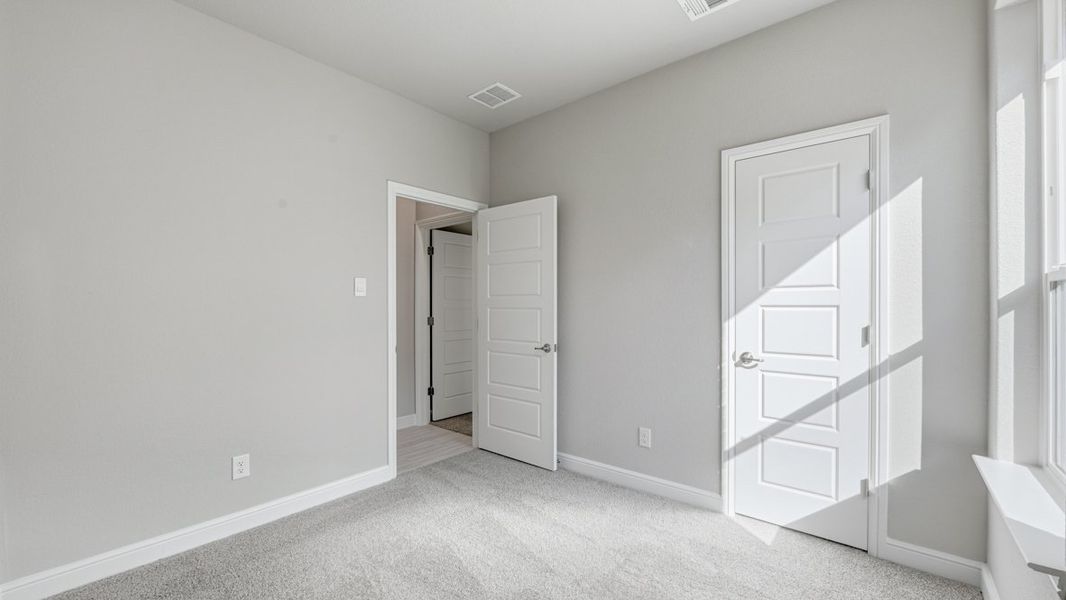 Representative unfurnished interior of a home built from the BASSWOOD by D.R. Horton in Treeline, Justin (Image 27).