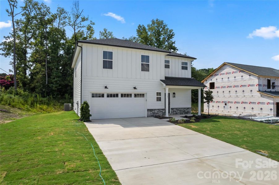 Front exterior of a new home in , Kannapolis, NC, highlighting curb appeal (Image 16).