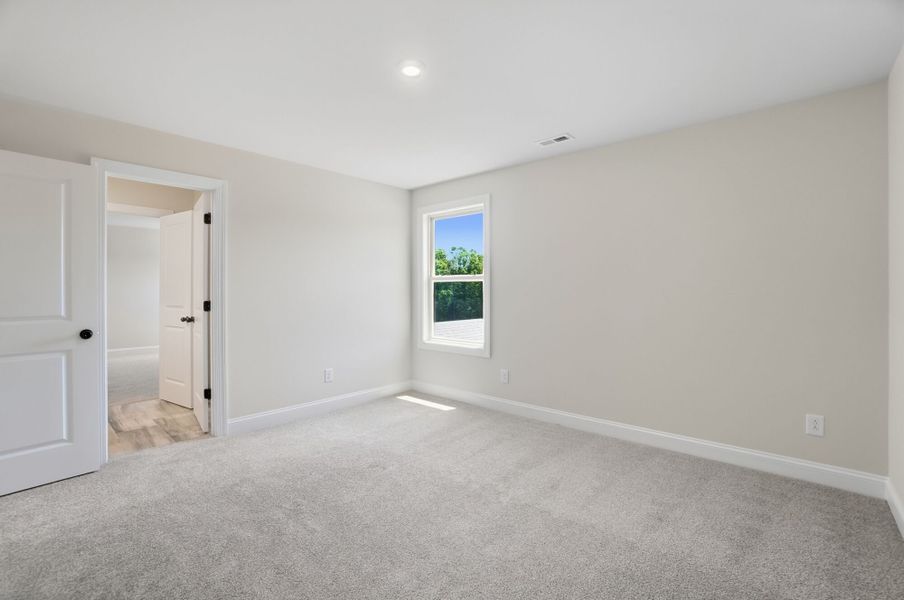 Spacious, unfurnished interior of a new home in Blair Place, Monroe (Image 37). Spacious, unfurnished interior of a new home in Blair Place, Monroe (Image 37).
