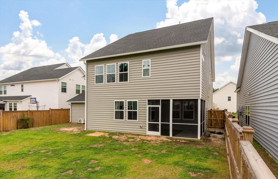 Exterior details and patio area of a home in Sweetgrass at Summers Corner, Summerville (Image 29).