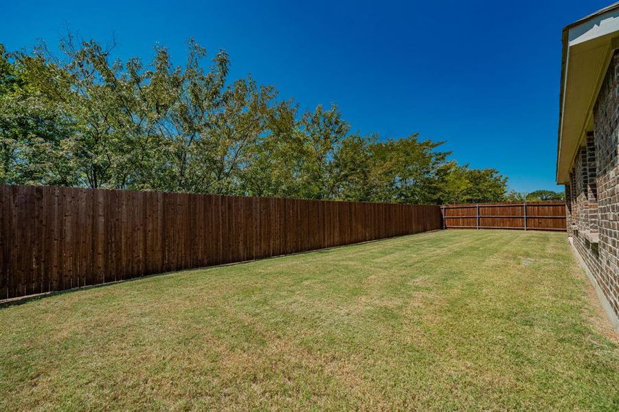 Front exterior of a new home in , Kaufman, TX, highlighting curb appeal (Image 22). Front exterior of a new home in , Kaufman, TX, highlighting curb appeal (Image 22).