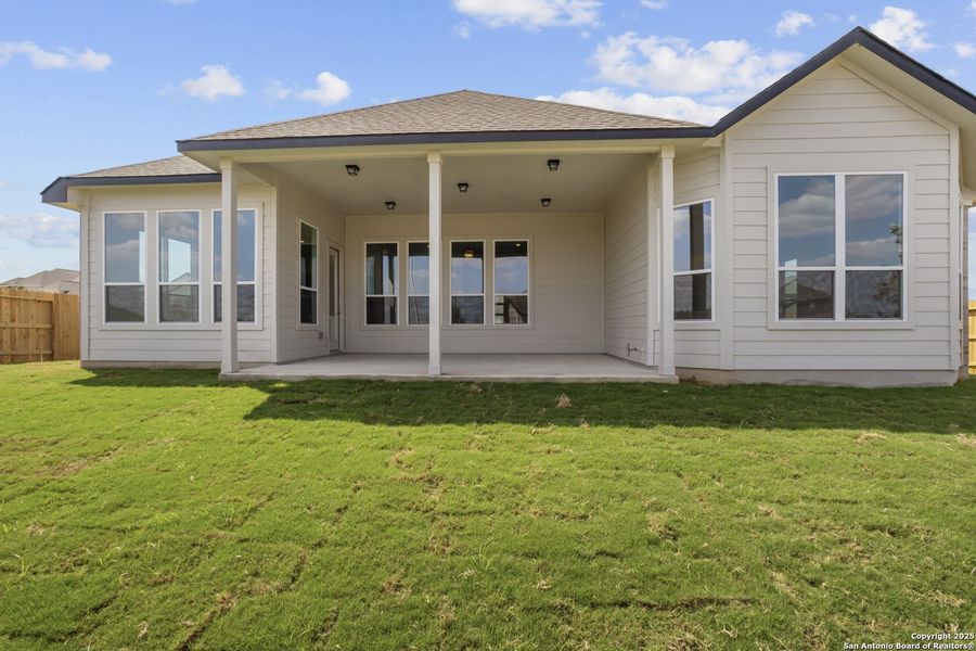 Exterior details and patio area of a home in Homestead 75', Schertz (Image 4).