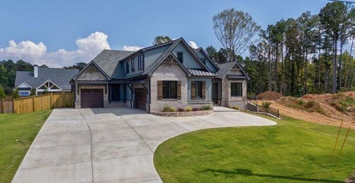 Front exterior of a new home in , Cumming, GA, highlighting curb appeal (Image 29).