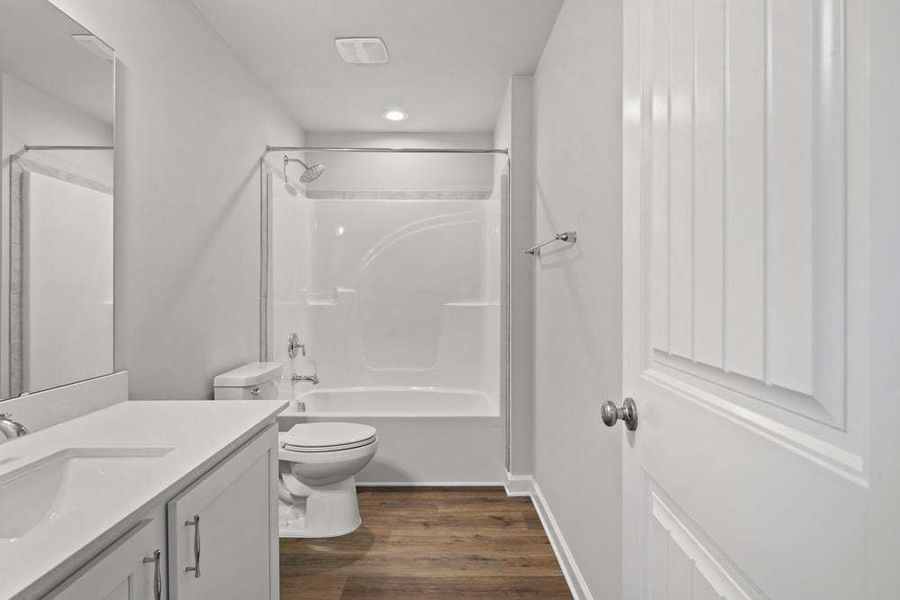 Representative furnished interior of a home built from the Camellia by Caviness & Cates Communities in Bartlett Manor, Youngsville (Image 26).