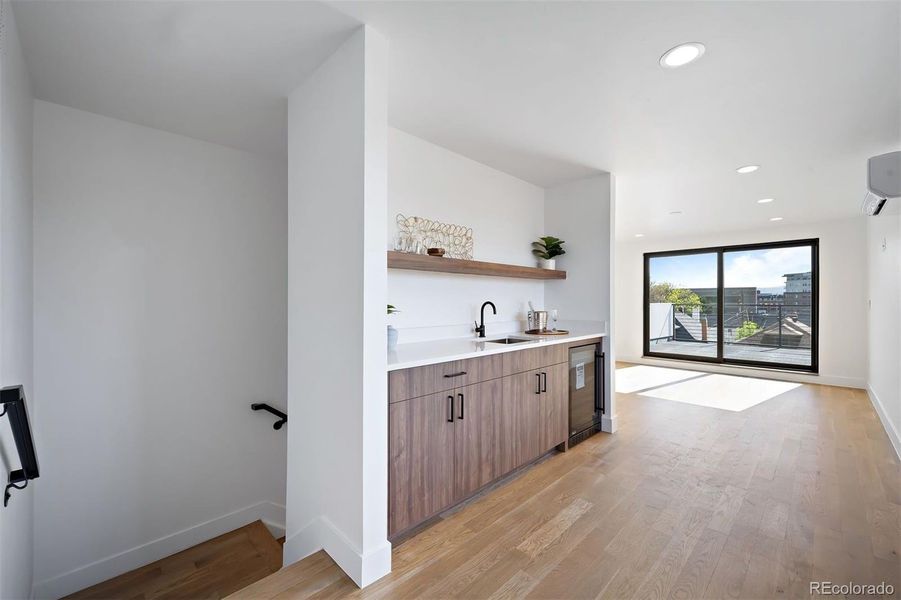 3rd floor bonus room and wet bar with beverage fridge