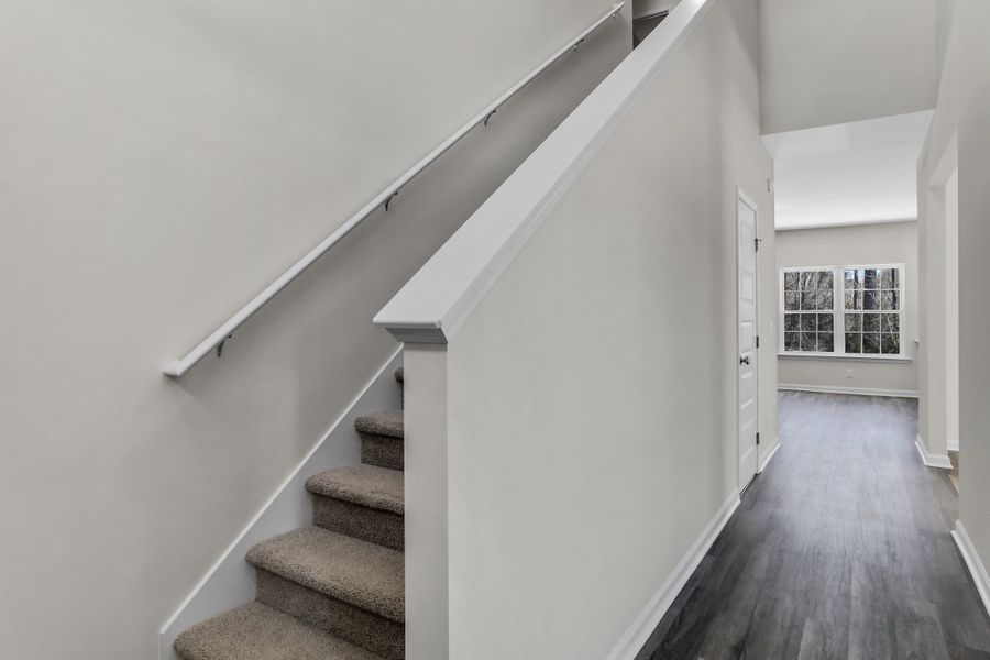 Representative unfurnished interior of a home built from the The Cedar Creek by RTS Homes in Grand Reserve, Hinesville (Image 10).