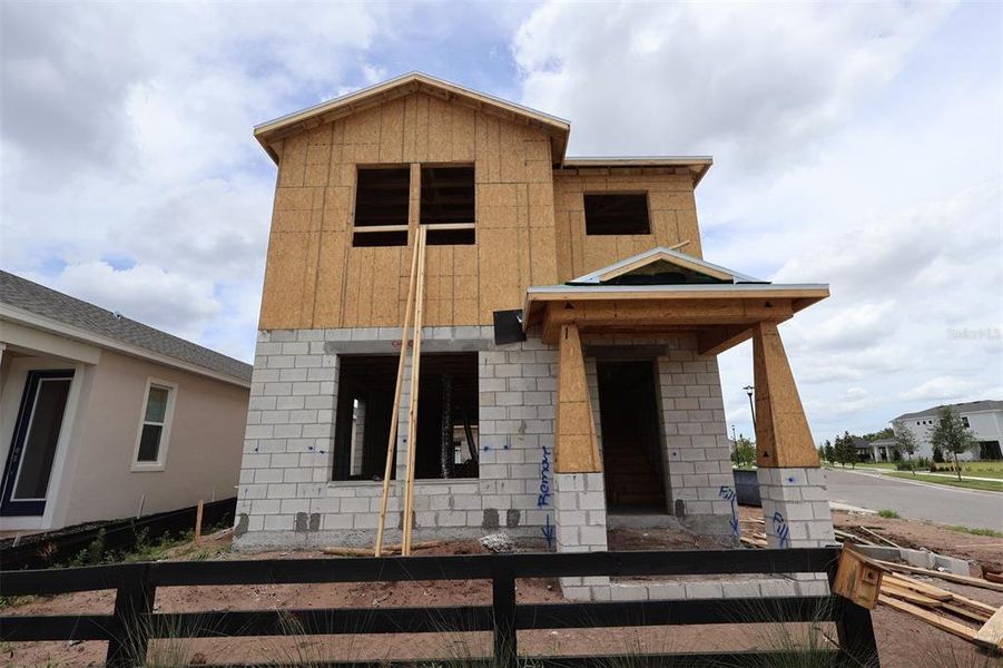 In-progress construction of a new home in Center Lake on the Park, St. Cloud, FL (Image 5).