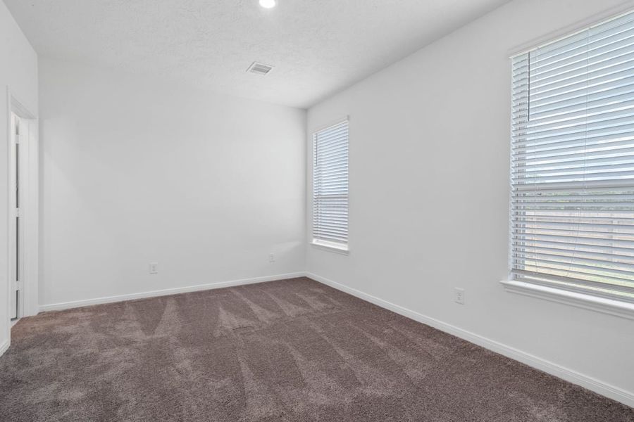 Spacious, unfurnished interior of a new home in Mustang Ridge, Magnolia (Image 20).