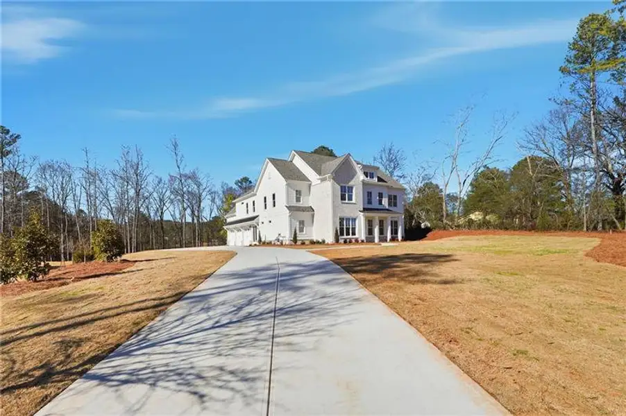 Front exterior of a new home in , Marietta, GA, highlighting curb appeal (Image 31).