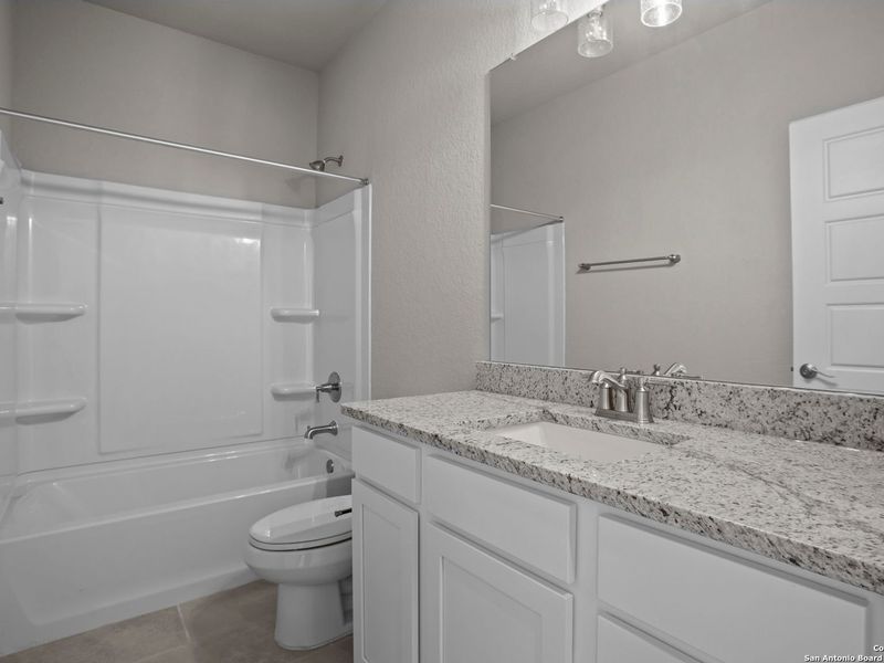 Furnished interior view inside a new home in Hannah Heights, Seguin (Image 30).