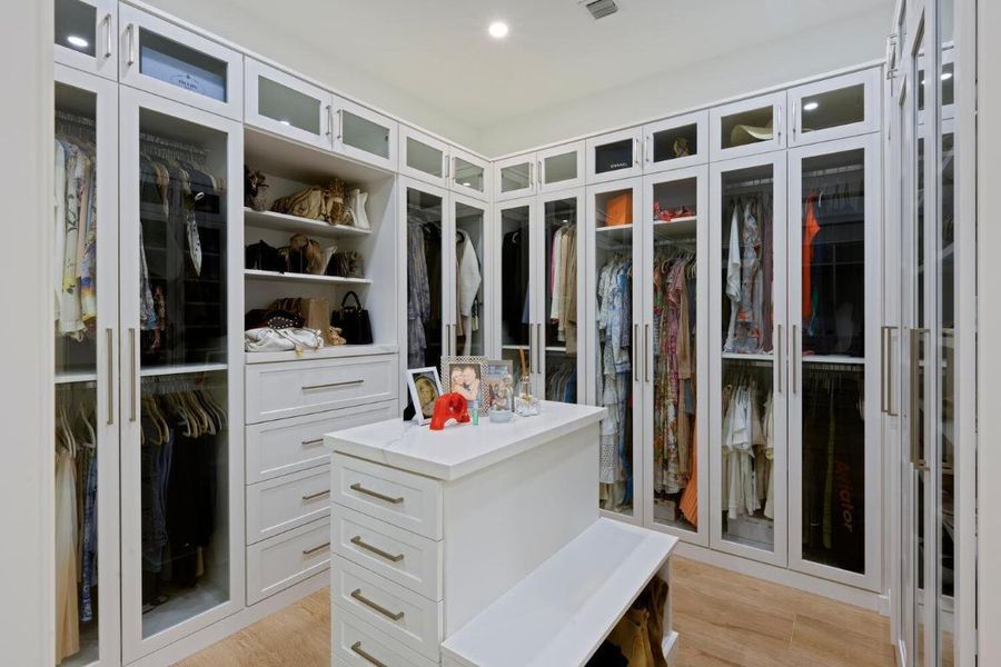 PRIMARY HERS CLOSET - 1ST FLOOR PRIMARY HERS CLOSET - 1ST FLOOR