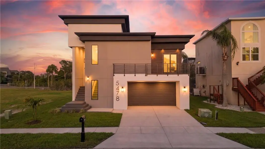 Front exterior of a new home in , New Port Richey, FL, highlighting curb appeal (Image 27).