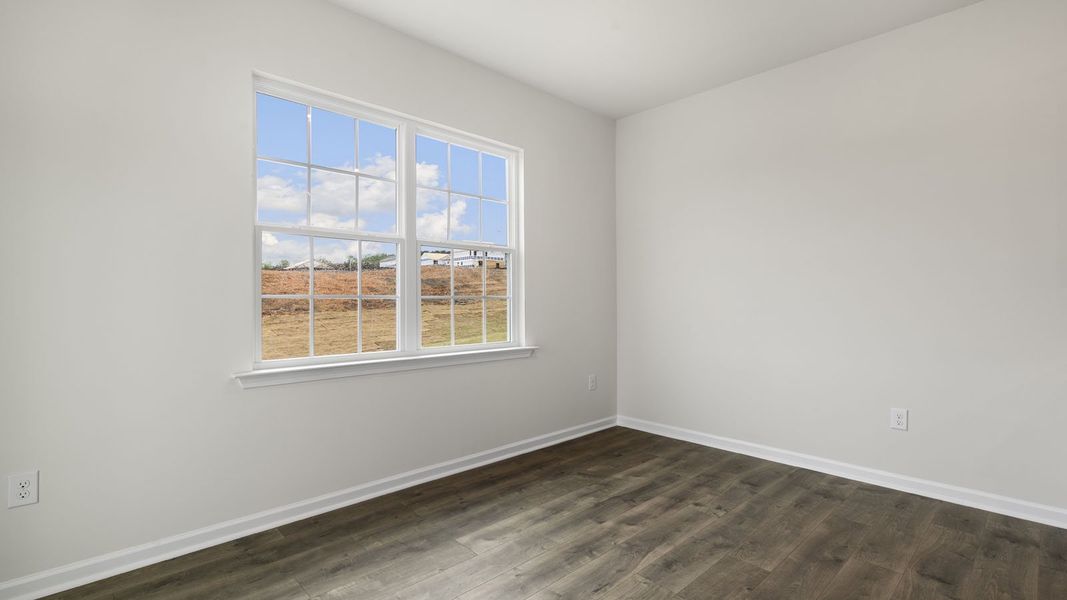 Spacious, unfurnished interior of a new home in The Grove at Matthews Landing, Fuquay Varina (Image 14).