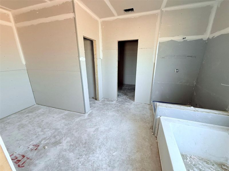 Primary bathroom with separate shower and soaker tub Primary bathroom with separate shower and soaker tub