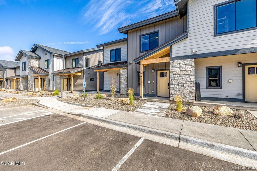 Front exterior of a new home in , Granby, CO, highlighting curb appeal (Image 23).