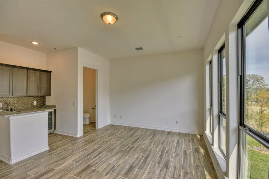 Spacious, unfurnished interior of a new home in El Sonido at Campanas, San Antonio (Image 21).
