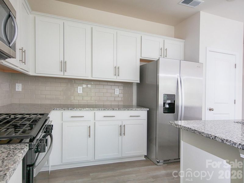 Furnished interior view inside a new home in Villas at Sherrills Ford, Terrell (Image 13).