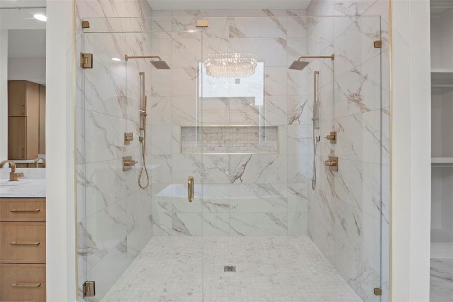 Full bath with vanity and a marble finish shower Full bath with vanity and a marble finish shower