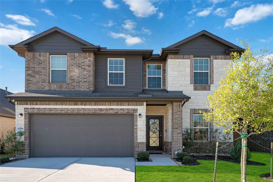 Welcome to 11938 Fletching Stone Lane! A striking stone elevation and manicured landscaping create instant curb appeal — this CastleRock “Trinity” plan stands out from the moment you arrive. Welcome to 11938 Fletching Stone Lane! A striking stone elevation and manicured landscaping create instant curb appeal — this CastleRock “Trinity” plan stands out from the moment you arrive.