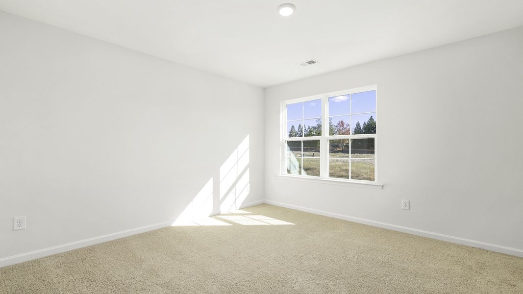Spacious, unfurnished interior of a new home in Brightwood Farm, Whitsett (Image 16). Spacious, unfurnished interior of a new home in Brightwood Farm, Whitsett (Image 16).