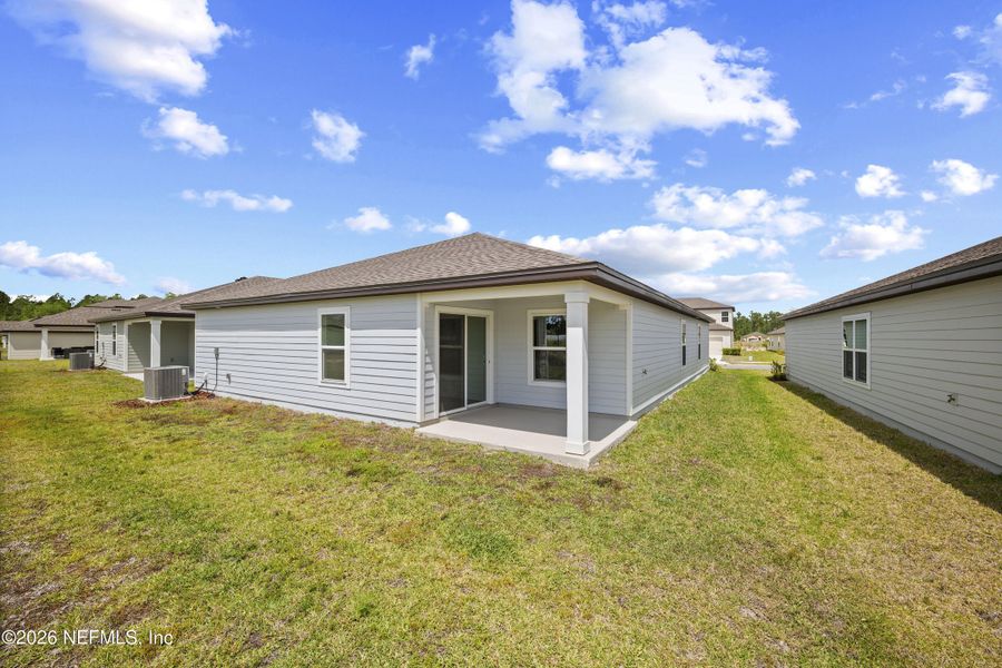 Exterior details and patio area of a home in Westport Landing, Jacksonville (Image 26).