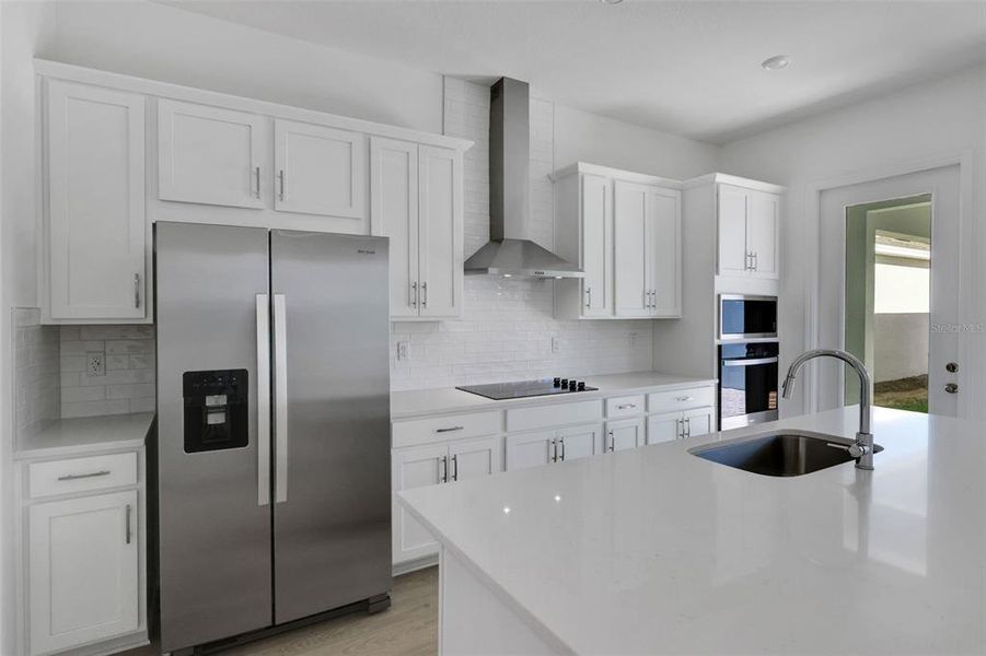 Furnished interior view inside a new home in Serenade at Ovation, Winter Garden (Image 15).