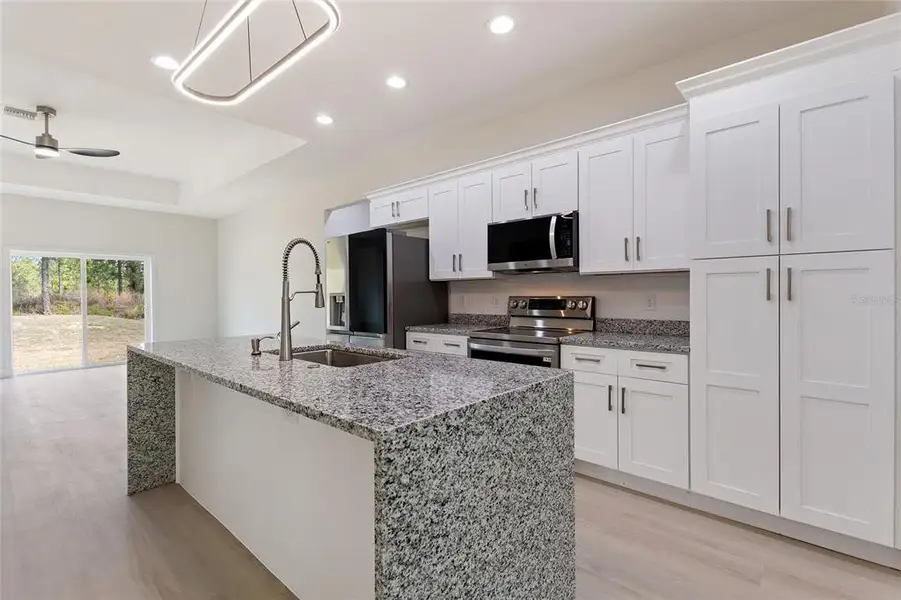 Furnished interior view inside a new home in , Indian Lake Estates (Image 7).