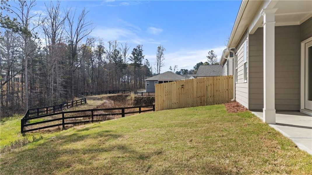 Exterior details and patio area of a home in Villages at Cedar Hill, Dallas (Image 2).