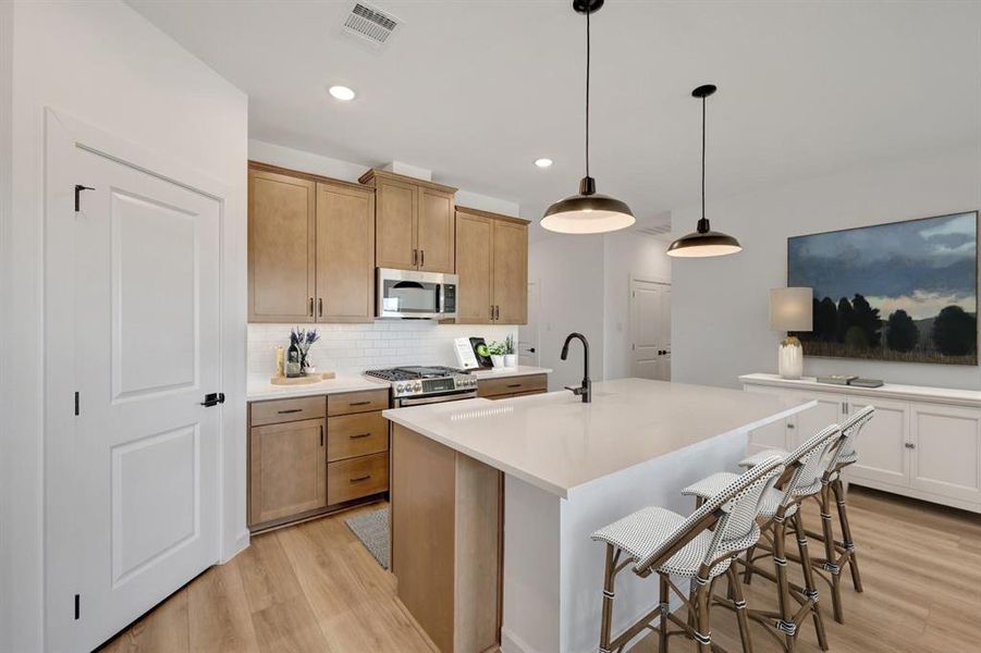 Furnished interior view inside a new home in Aspire at Noble Ridge, Howe (Image 6).