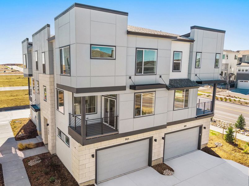 Exterior details and patio area of a home in Lyric at RidgeGate Townhomes, Lone Tree (Image 19).