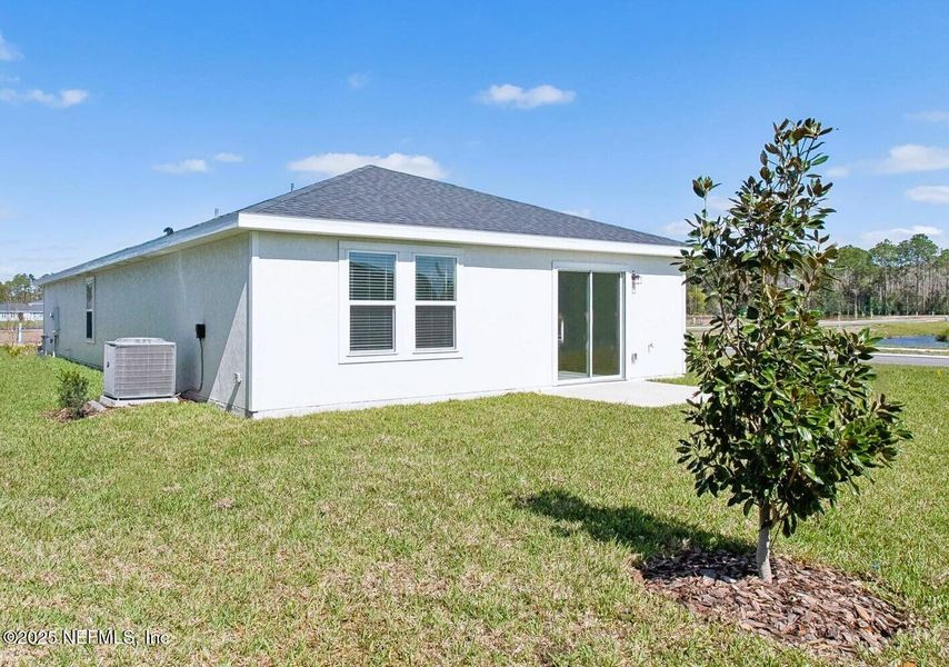 Exterior details and patio area of a home in Flagler Village - Classic Series, Palm Coast (Image 24).