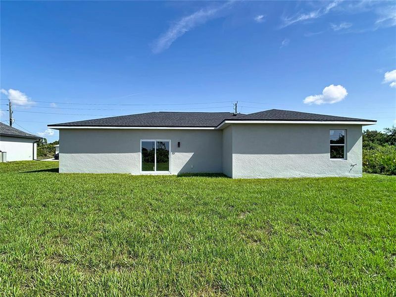 Exterior details and patio area of a home in , Port Charlotte (Image 16). Exterior details and patio area of a home in , Port Charlotte (Image 16).