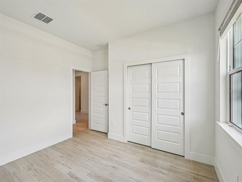 Spacious, unfurnished interior of a new home in Magnolia Bay - Reserve Series, Nokomis (Image 10). Spacious, unfurnished interior of a new home in Magnolia Bay - Reserve Series, Nokomis (Image 10).