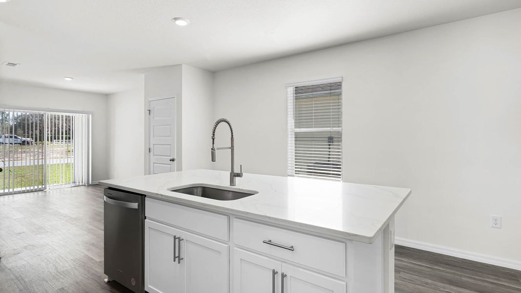 Representative furnished interior of a home built from the ASTOR by D.R. Horton in Harmony at Lake Eloise, Winter Haven (Image 6).
