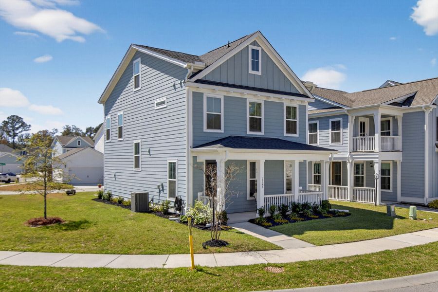 Front exterior of a new home in Twin Lakes, Johns Island, SC, highlighting curb appeal (Image 27).