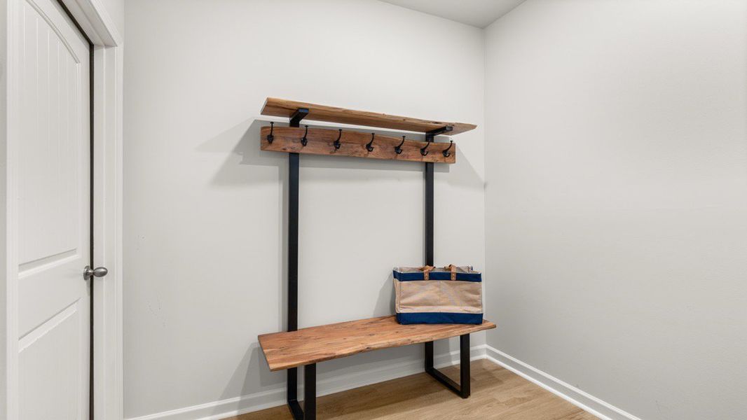 Representative furnished interior of a home built from the ADDINGTON by D.R. Horton in Waypoint, Flowery Branch (Image 15).